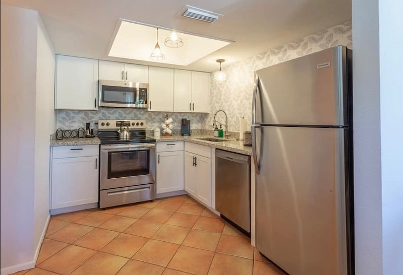 Full kitchen with pots and pans.