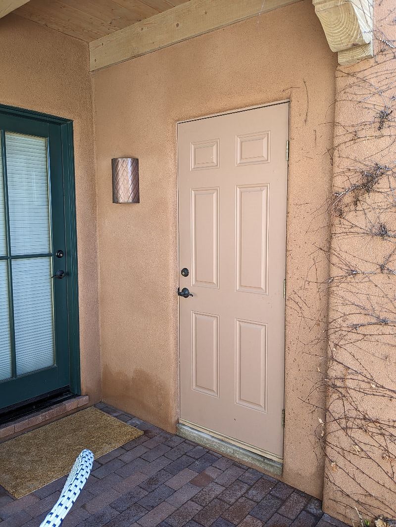 Door to locked exterior insulated closet/pantry, accessed from front portal