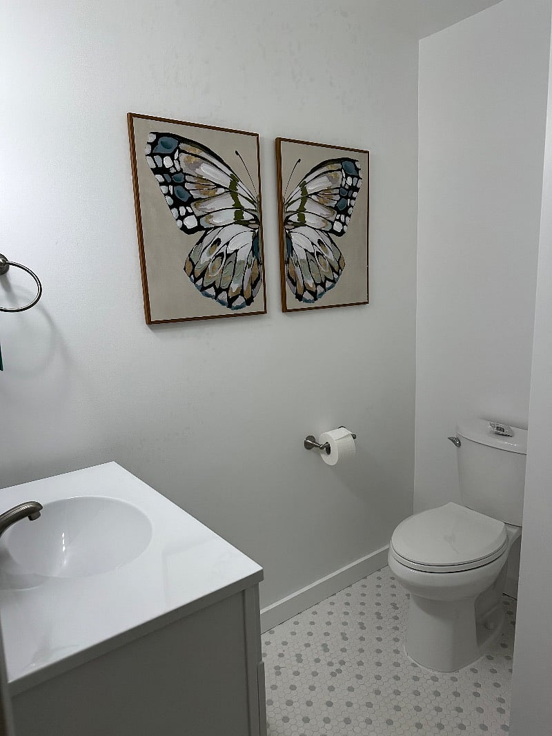 Bathroom with wall in shower
