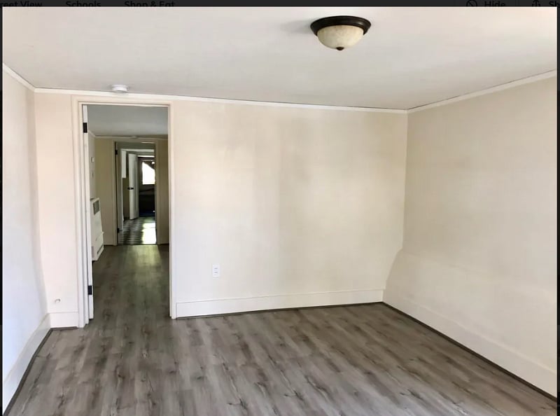 (Pre-furnished_ showing other side of living room