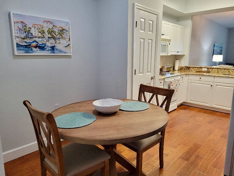Separate kitchen dining table.