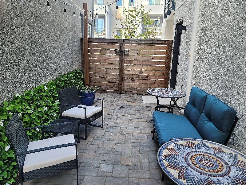 Peaceful sideyard for your morning coffee or evening cocktails
