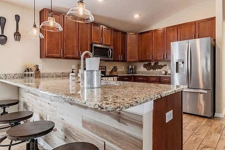 Kitchen with granite countertops and breakfast area