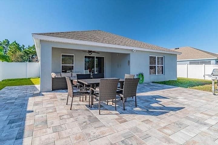 Enjoy private full patio with table and cushion sectional seating