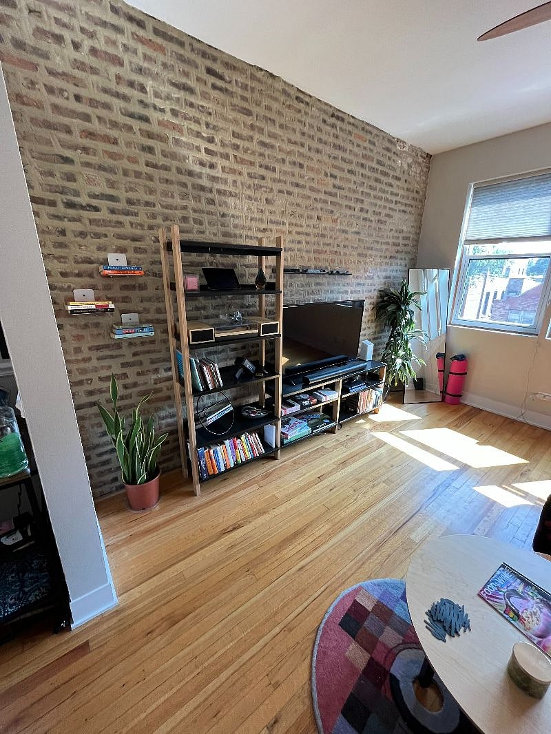 Living room with exposed brick