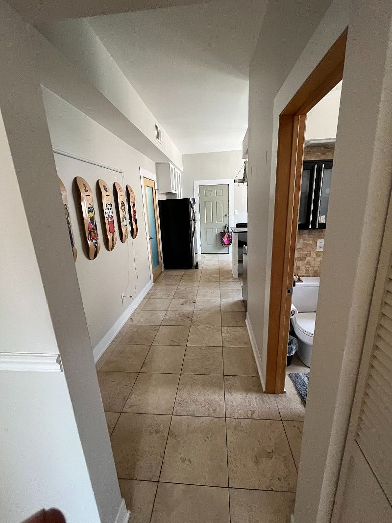 Bathroom and kitchen on right. Guest bedroom is locked on left.