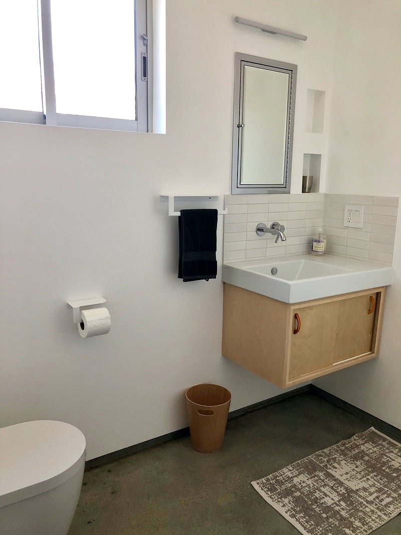 Bathroom has under sink and medicine cabinet storage.