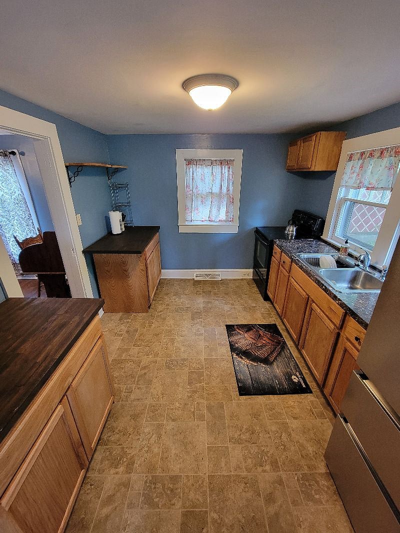 Kitchen with butcher block cabinets