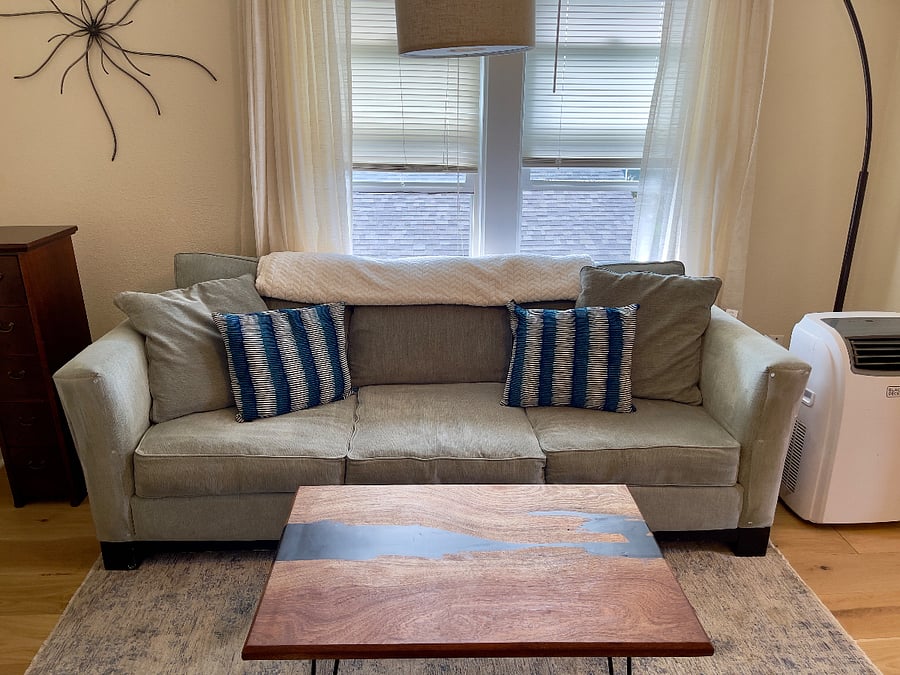 Large sofa with fold-out bed.