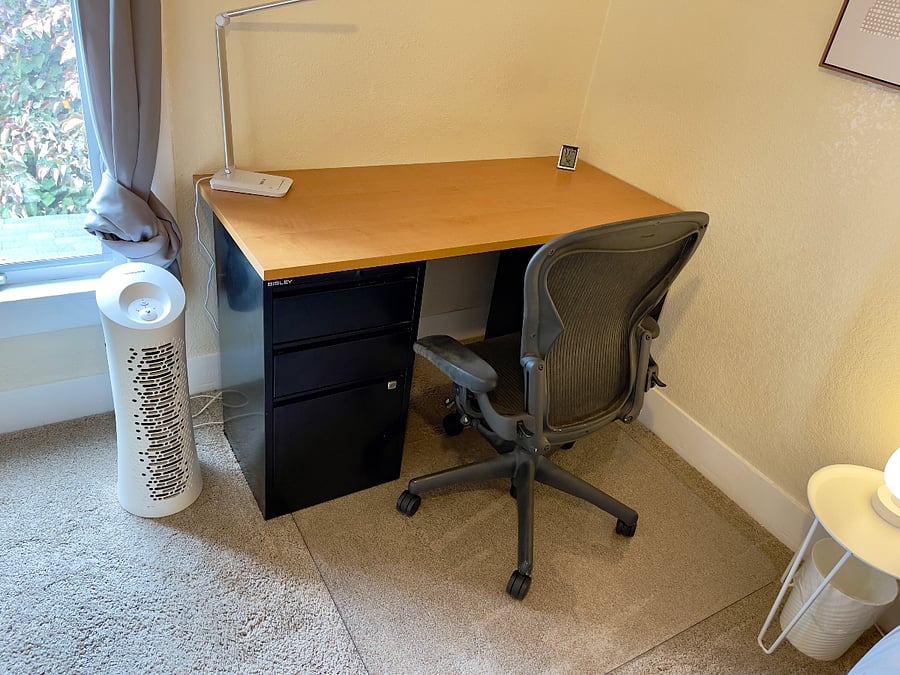 First bedroom: Desk with filing cabinets.