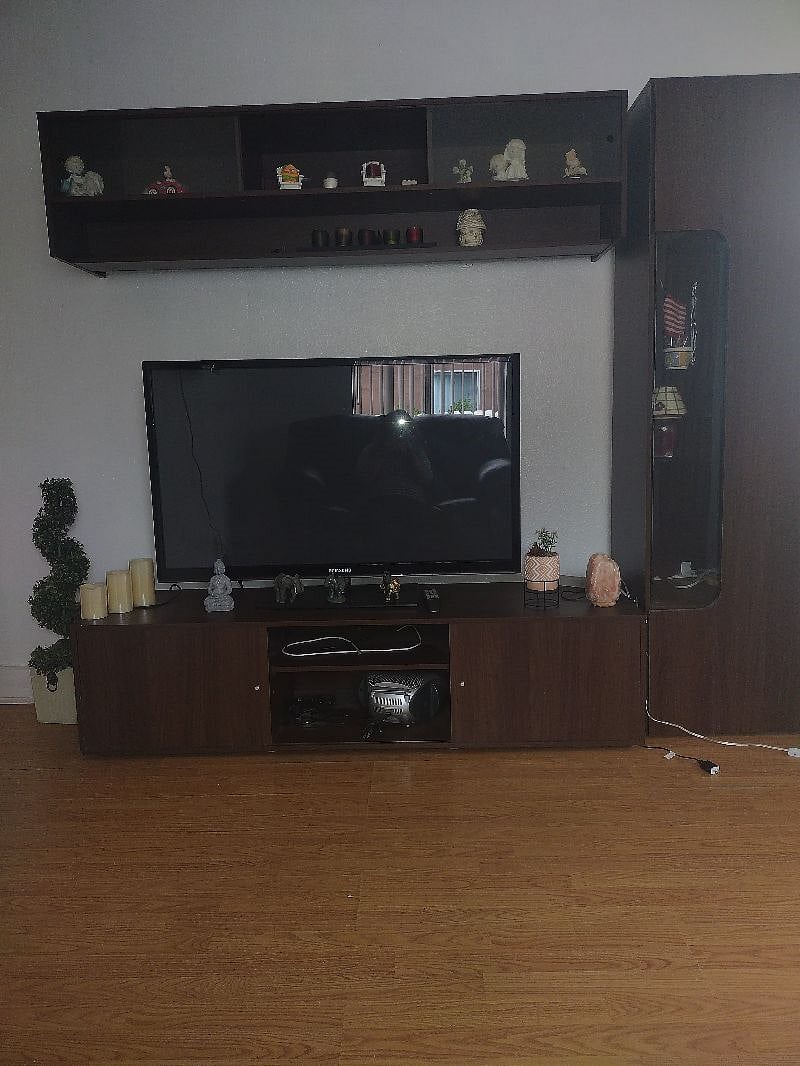 Living room is not too big but, welcome to sit here and watch t.v.