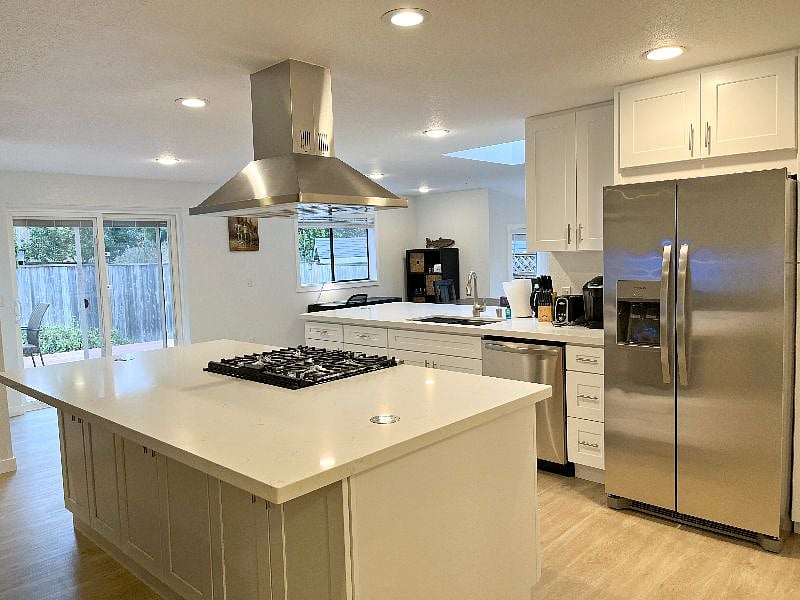 Enjoy preparing your meals in this fully equipped kitchen with a gas range and stainless steel appliances
