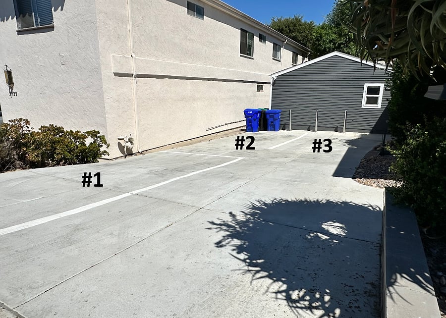 The driveway is shared between units on the property. There is 1 spot for your use (there are 3 spots, you may choose any one). If you have additional cars, street parking is available.