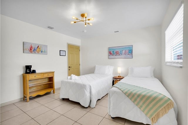 Standard Bed setup is KING SIZE, this picture is the option available on request
