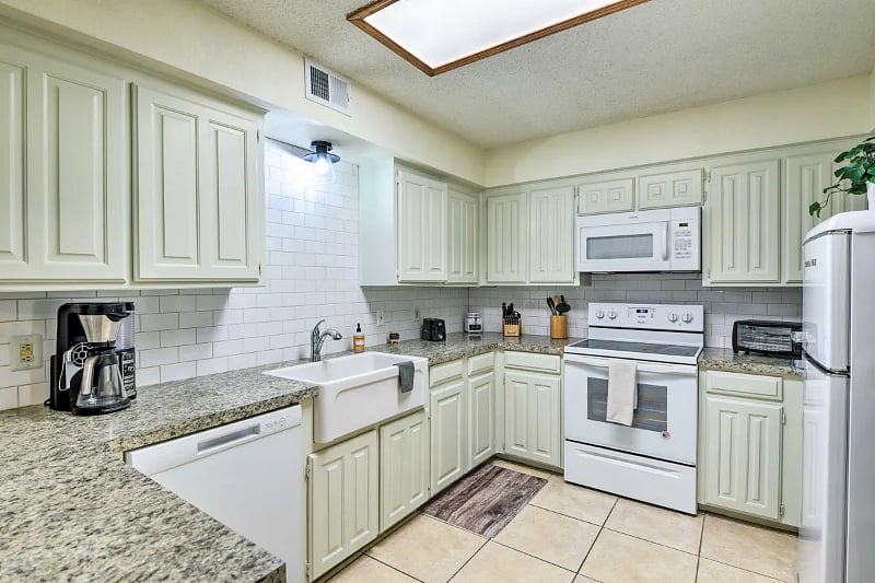 Kitchen with essentials ie Keurig Coffee Maker (not pictured), Insta Pot, Retro Fridge, Air Fryer, Microwave, Blender, Toaster and more.