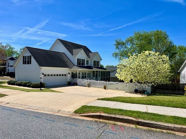 This shows the rear of the house with the driveway. 
