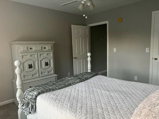 Bedroom #1 fully furnished with double bed, 2 night stands and a tall bureau.