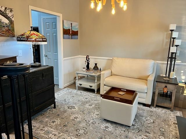Sitting Room just off the kitchen (this would be the dining room in most homes.)

Available as common space.