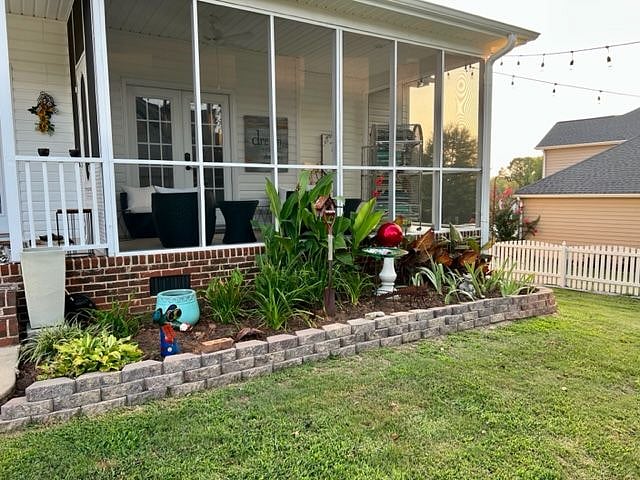 Screened in back porch view.