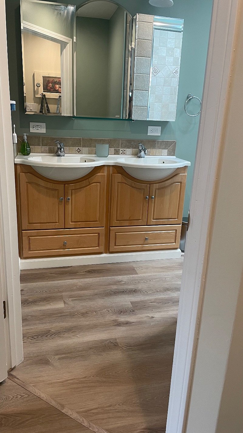 Dual sinks & large double  fmedicine cabinet in the bathroom.