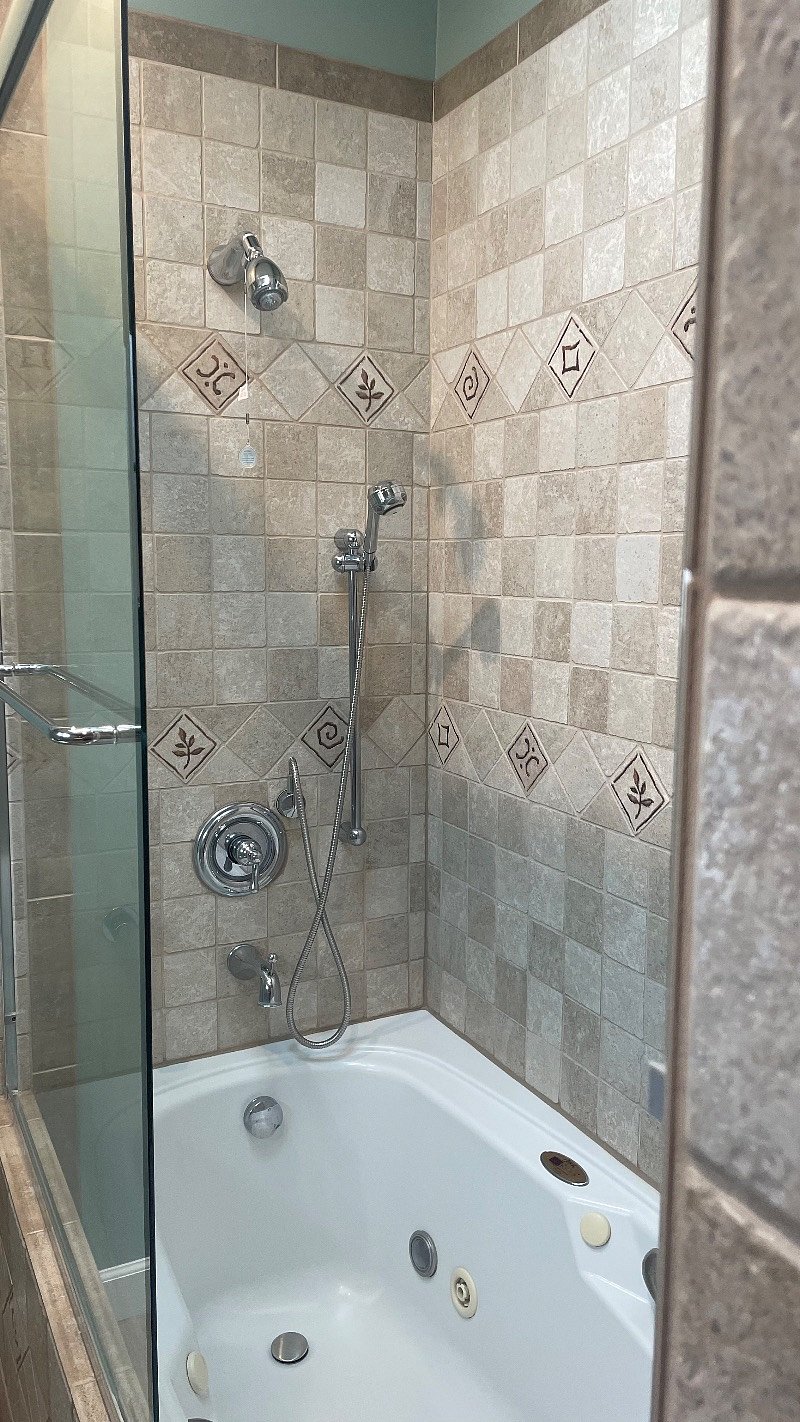 Full function rain shower with additional hand sprayer.