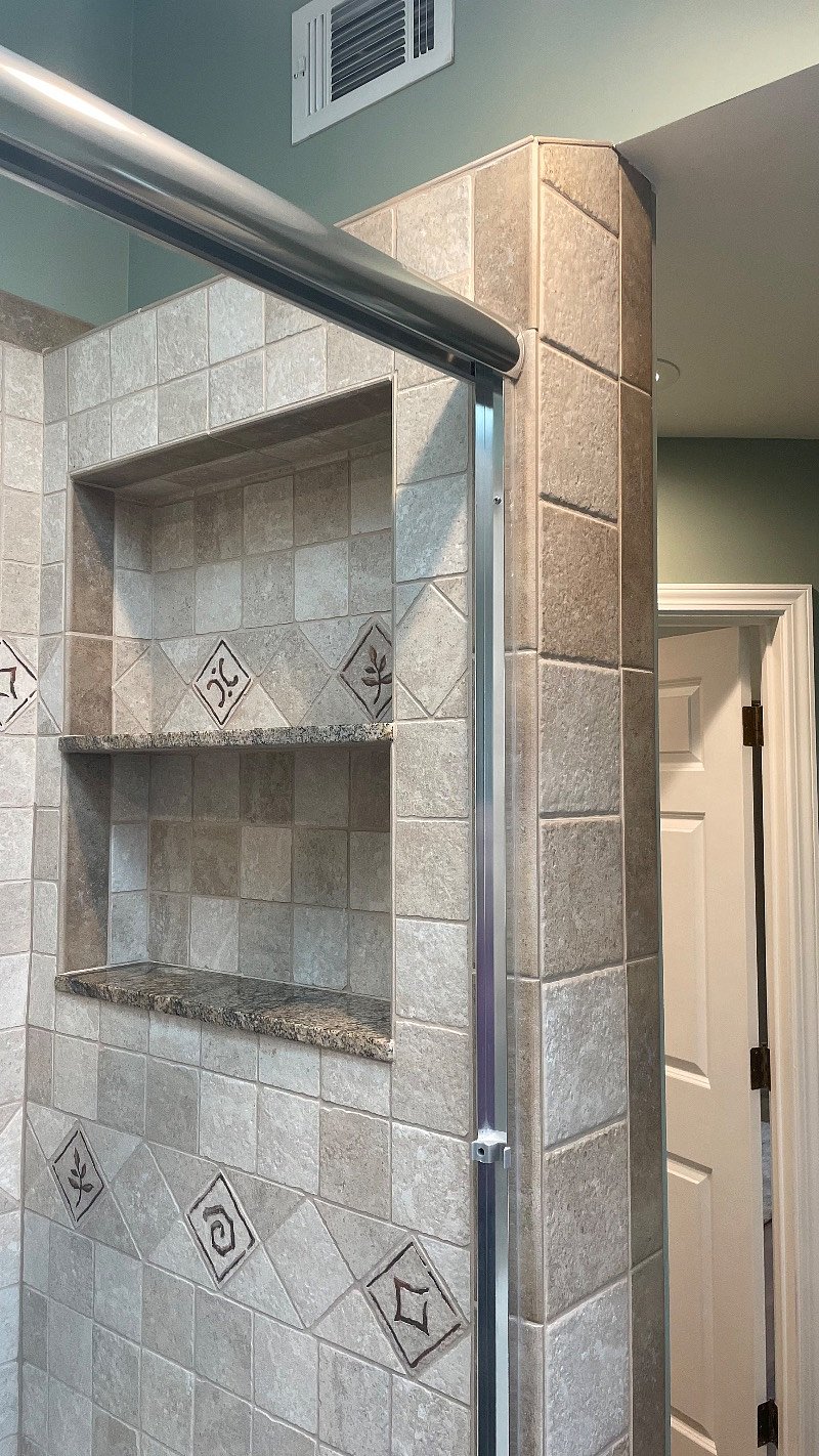 Plenty of shower storage space - basic shower products are included.