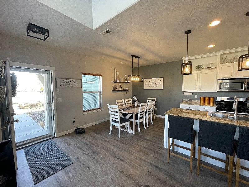 Front entrance, dining area, and kitchen.