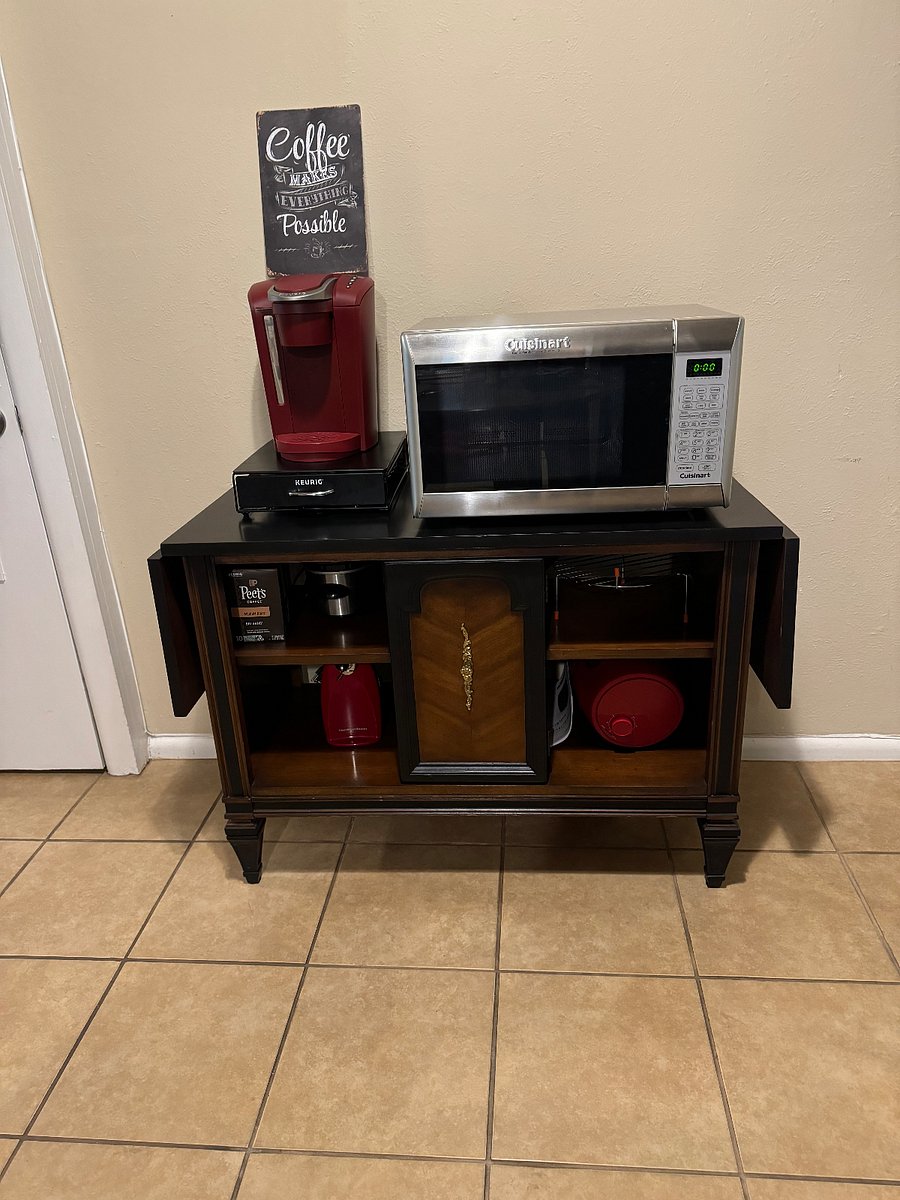 Coffee bar has appliance in the cabinet also Please no leaning on side boards or heavy appliances on ends
Blender is glass be cautious removing it. Can opener, over fryer, blender, george foreman, and a small crock pot for one-two are in it for your use.