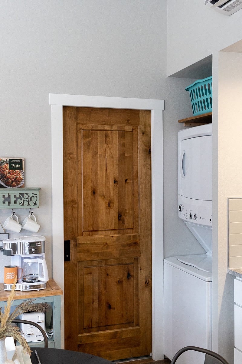 The bathroom has a pocket door