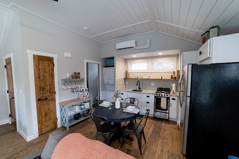 Looking toward the dining area and kitchenette from the living area