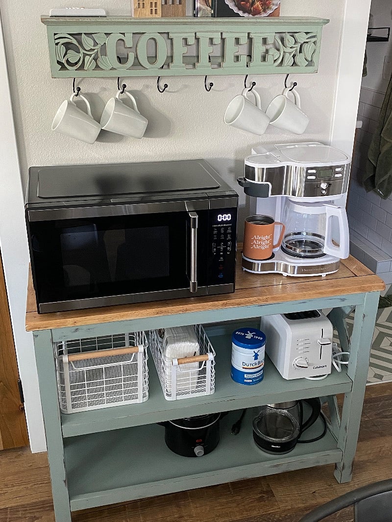 Microwave, coffee machine with single brew option, toaster, tea kettle, mini crock pot, and more