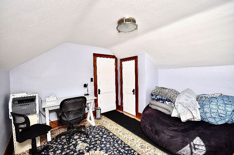 "The sunroom" (upstairs office) is a peaceful nap spot with a full-sized office desk. 