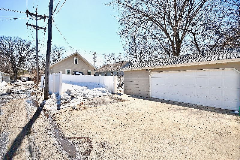 Parking: 
Driveway--FREE. 
Two-vehicle garage-- available for an extra $100/ month. Remote openers included. 