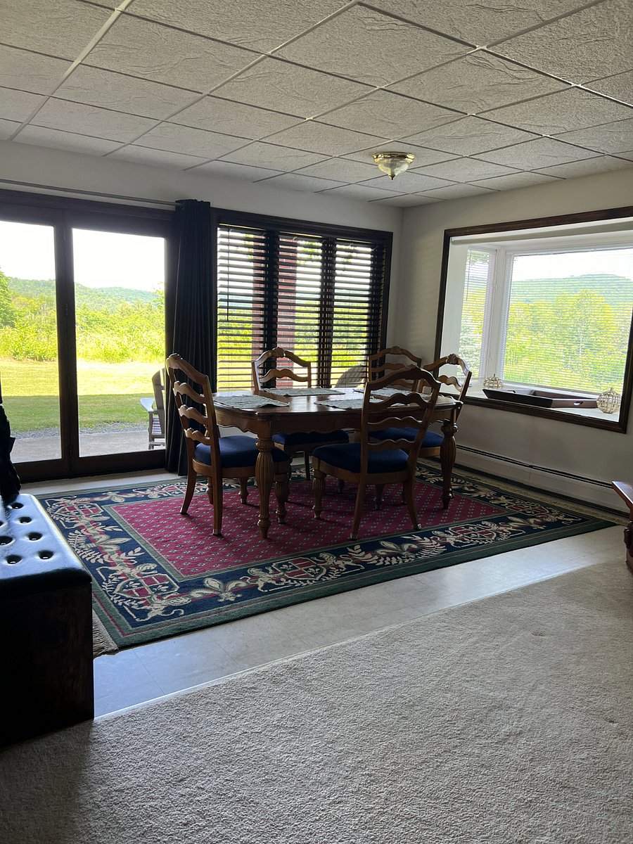 Dining room with 6 chair seating and beautiful views from windows.