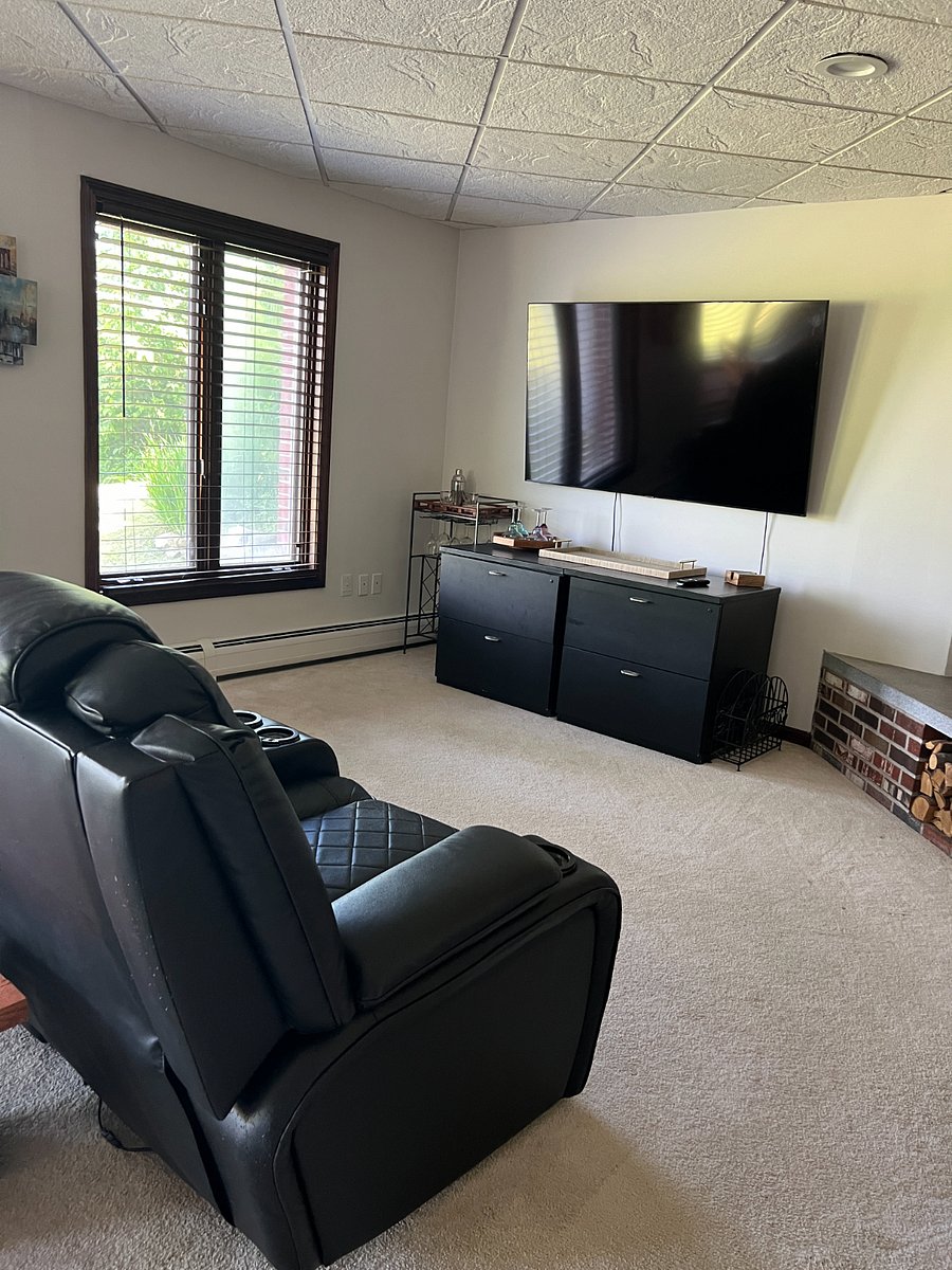 Living room with large smart tv.