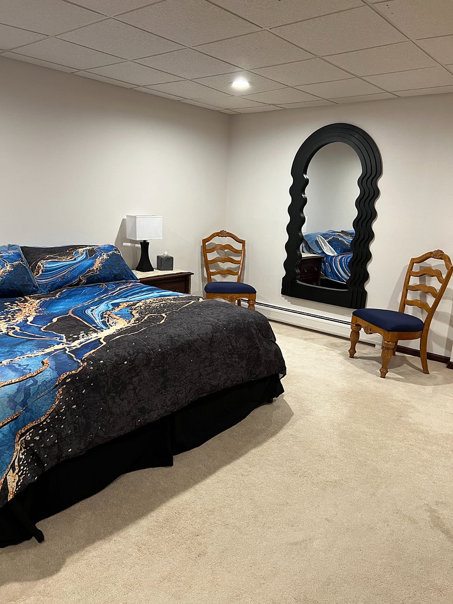 Master bedroom with king size bed.