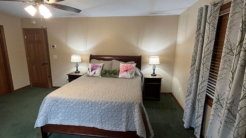 Master Bedroom--Queen bed and mounted TV