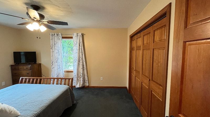 Queen bedroom with private television.