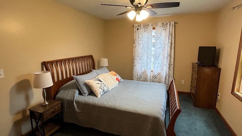 Queen bedroom with private television.