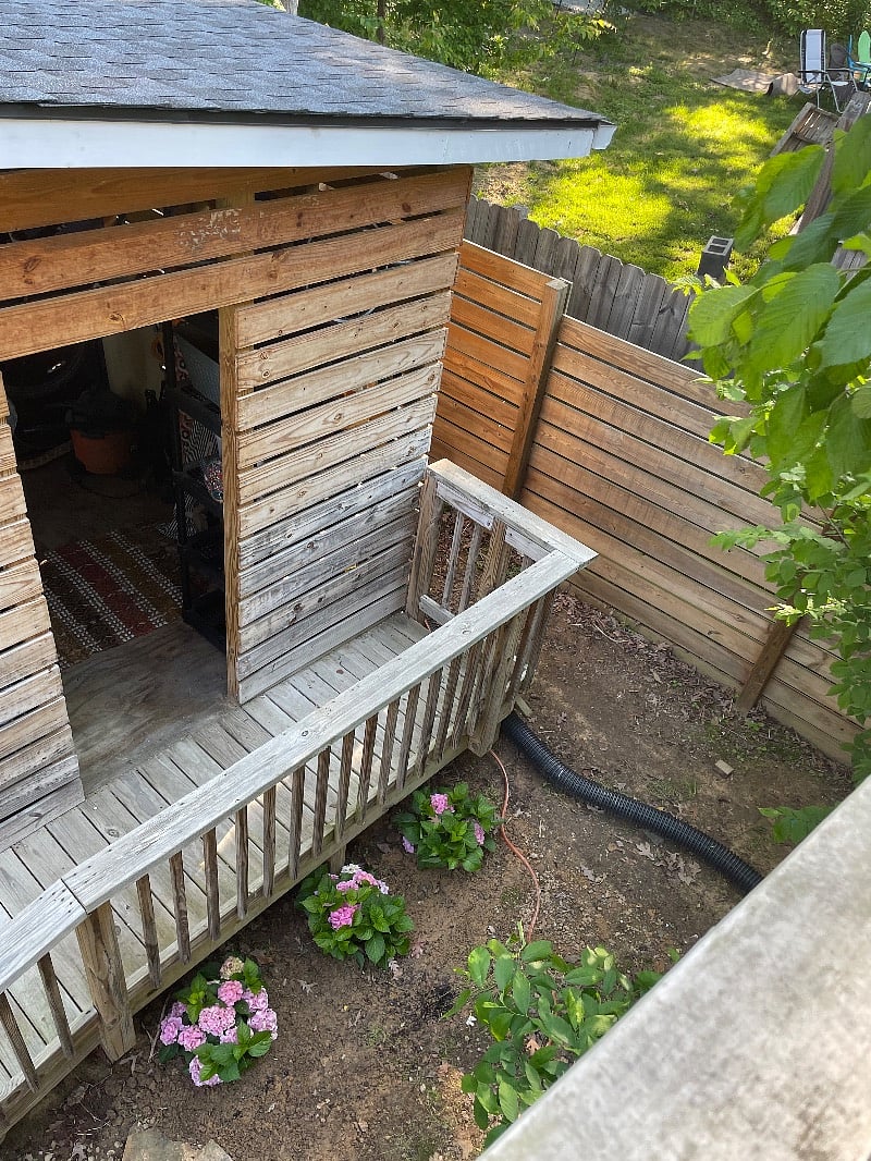 view from stairs at doorway to unit