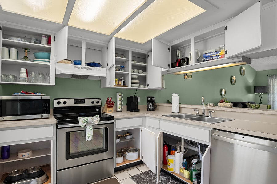 Fully stocked with dishware, glasses, Cuisinart pots & pans, Blender, Coffee makers, and more!