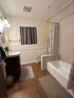 Bathroom with tub and shower.