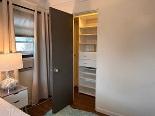 Closet with built-in drawers and shelves. 3 rods for hanging clothes