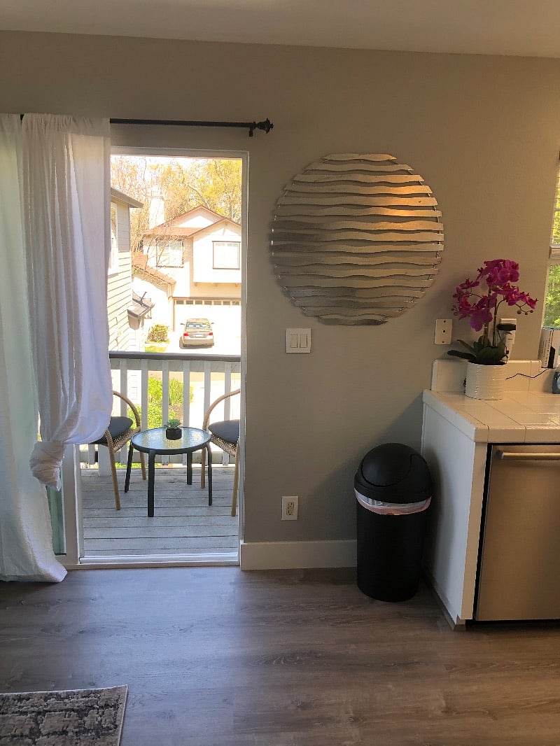 Private patio just outside the kitchen sliding glass doors with seating.