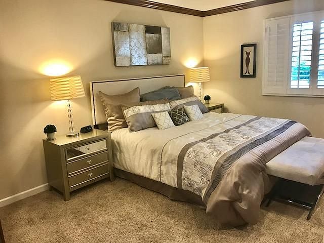 Primary bedroom w/King bed! Wall to wall built-in drawers & closets!