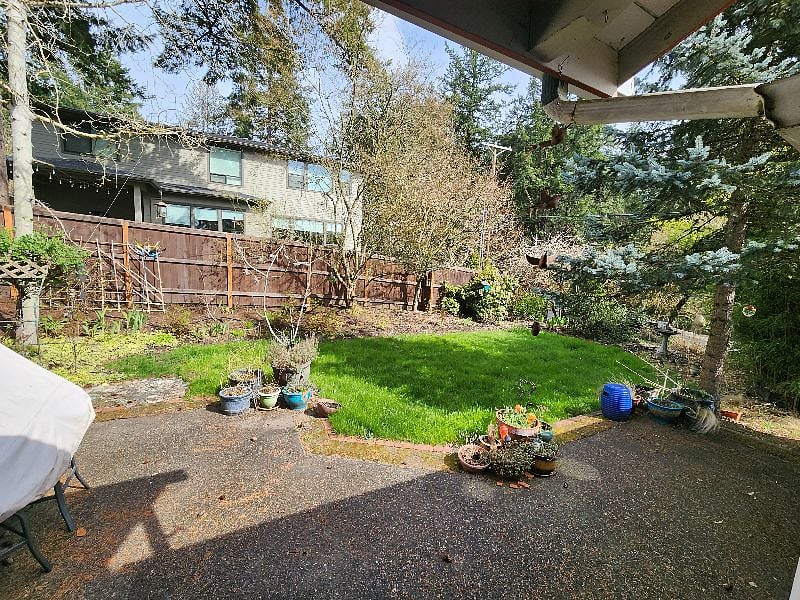 Patio off dining room. Patio table, gas BBQ grill.
