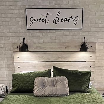 Comfy queen bed.  Headboard equipped with reading lights and usb ports for charging your personal devices.