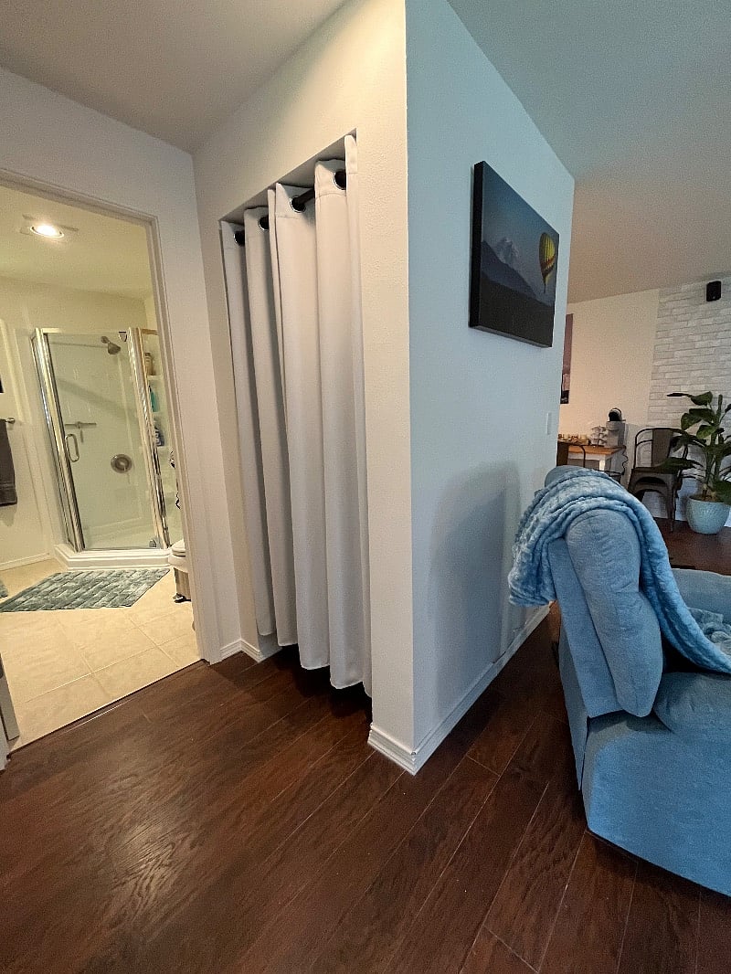 closet for hanging clothes, storing shoes, & storage for provided vacuum.