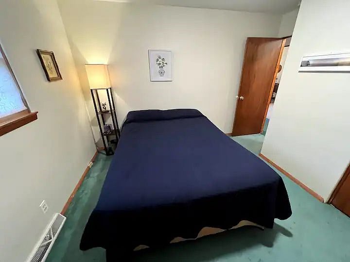 A comfy second bedroom with queen bed is available for guests or an additional resident.