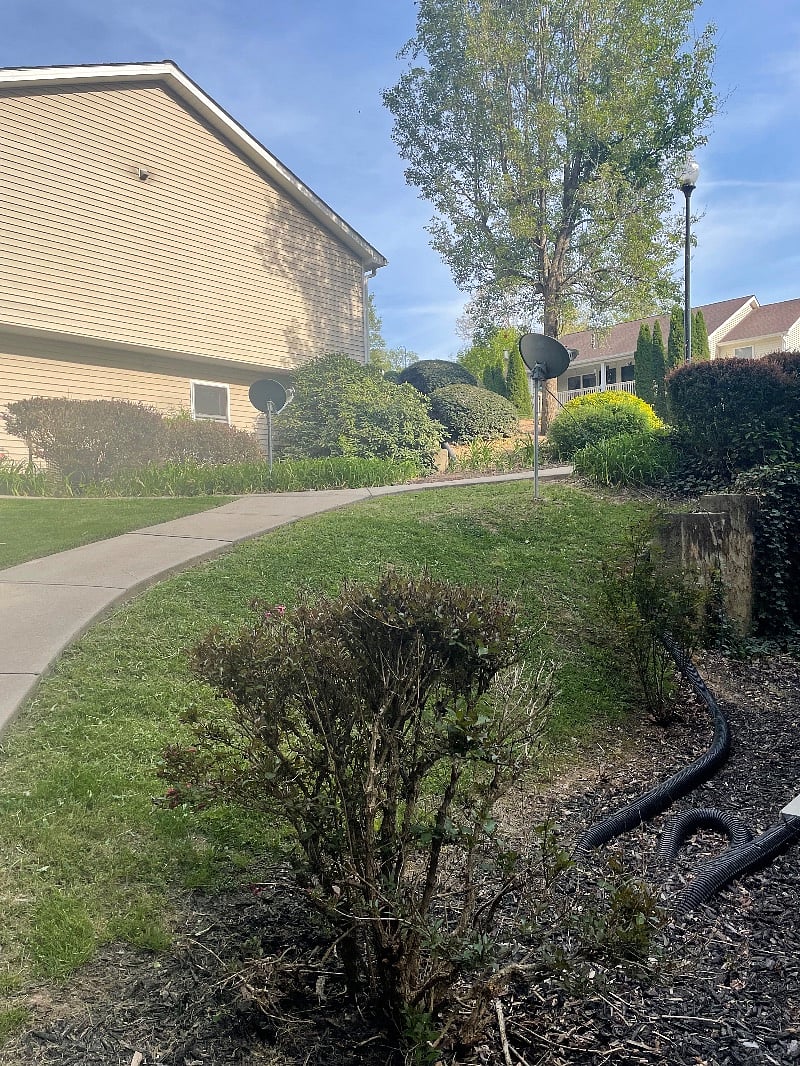Sidewalk leading from your private front porch to your parking space 